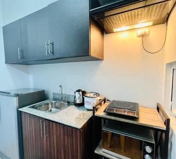 Muntinlupa Apartment | At Home Condo With Free Pool Access