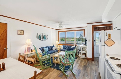 Kitty Hawk House | ATLANTIC BREEZES SOUTH - This airy duplex is steps from the beach!