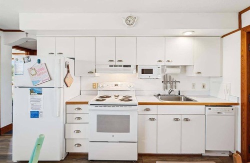 Kitty Hawk House | ATLANTIC BREEZES SOUTH - This airy duplex is steps from the beach!