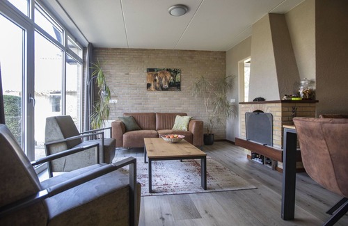 Bisselt House | Atmospheric house with a fireplace in a holiday park in the woods