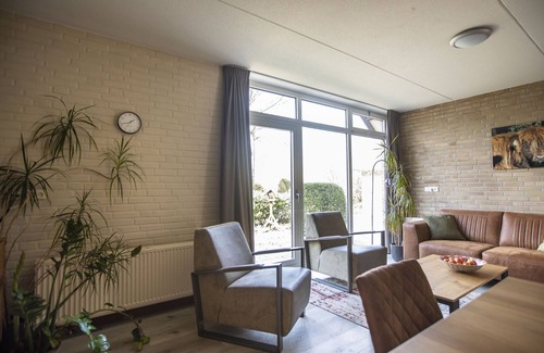 Bisselt House | Atmospheric house with a fireplace in a holiday park in the woods