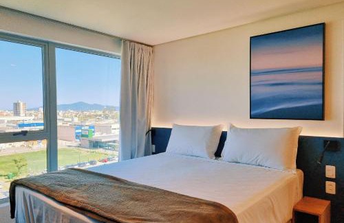 Florianopolis Apartment | Atrium Studios by Xtay – Estúdios modernos, bem localizados e a 9min da Arena Opus