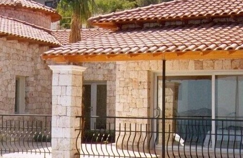 Kas Villa | Attractive villa with a large pool and private sea access - stunning view