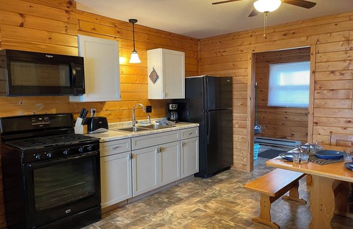 Walker Resort | August 9-16 Charming 2-BRM resort cabin- Heated Pool, Beach, Lake Toys &Fishing