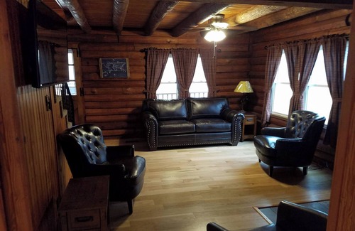 Mountain Home Apartment | Authentic Log Cabin in the Southern Ozark Mountains with hot tub