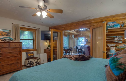 Enchanted Oaks Cabin | Authentic log cabin on Cedar Creek Lake - spectacular views from all 3 decks