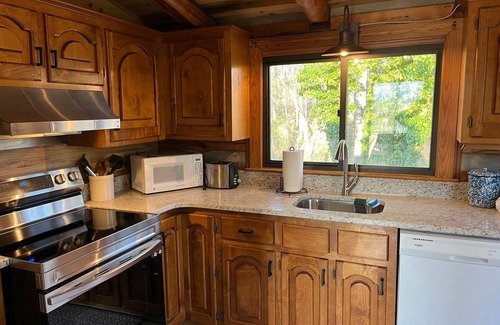 Front Royal Cabin | Authentic Mountain Log Cabin Perched On A Cliff Side Above The Shenandoah River