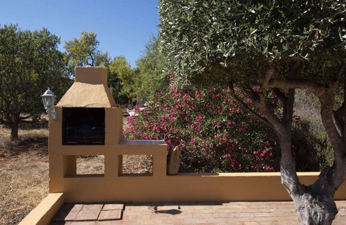 Loule Villa | Authentic yet modern villa and cottage with pool.