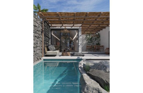 Perivolos House | Avramiea Suite | walk out Sea View patio with Private Heated Pool