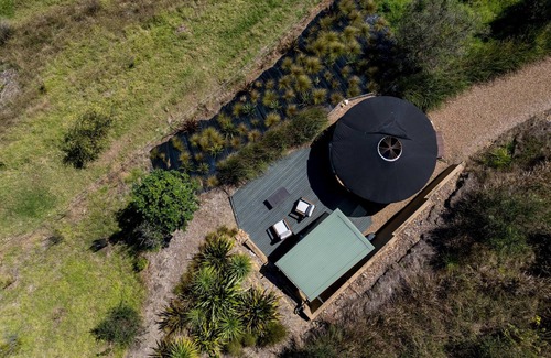 Palm Beach Cabin | Awaawa Yurts - Combined - 3 Yurt Package - Awaawa Yurts offer a luxury glamping experience on Waiheke Island. Stunning views, luxury queen sized bed, private bathroom with tea and coffee making facilities.