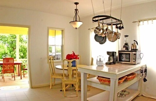 St. John's Cottage | Award-Winning, Charming Cottage in a 6-minute walk from a white sand beach.