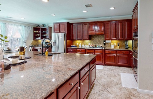 Cypress House | Azal House | Luxe house in Cypress with a pool, hot tub, & gourmet kitchen