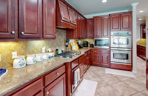 Cypress House | Azal House | Luxe house in Cypress with a pool, hot tub, & gourmet kitchen