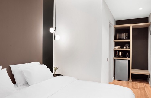 Attiki Apartment | B1: The "Asprogeraka" by SPACEERS