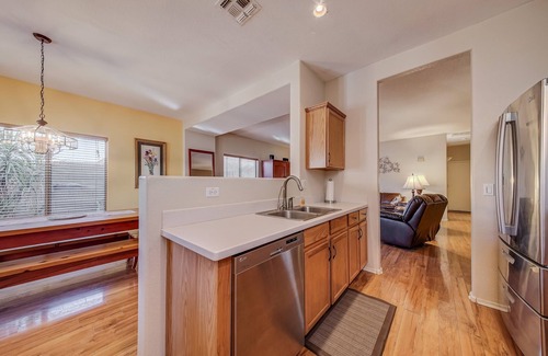 San Tan Valley House | Backyard oasis with private solar heated pool, hot tub and tons of amenities!