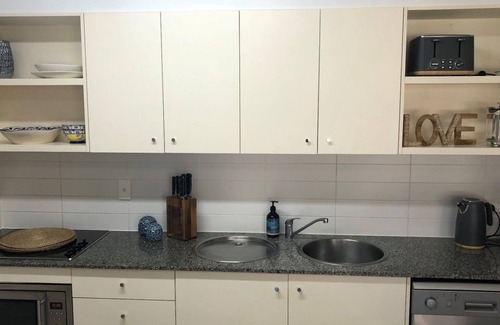 Rainbow Beach Apartment | Baden 70 - Rainbow Shores. Ground Floor. Air Con. Overlooking lap pool. Wi-Fi