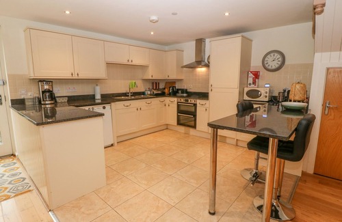 Newborough House | BARN END, 9 STAD CLYNNOG, pet friendly, with a garden in Newborough