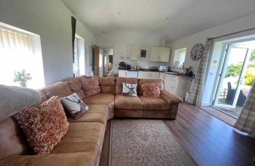 Roydon House | Barn in quiet location yet close to local amenities. Hot tub and games room.