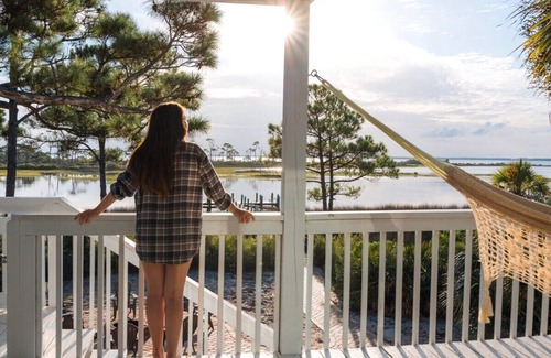 Cape San Blas Cabin | Bay Front w Dock! Hot tub, Beach across the street, Pet friendly