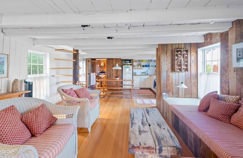 Ocean Bay Park Apartment | Bay-view apartment with deck, grill, enclosed porch, full kitchen, & WiFi
