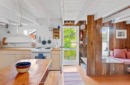 Ocean Bay Park Apartment | Bay-view apartment with deck, grill, enclosed porch, full kitchen, & WiFi