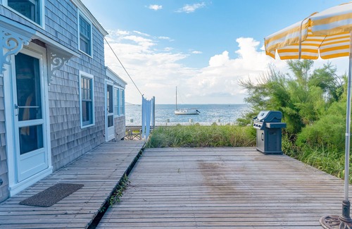 Ocean Bay Park Apartment | Bay-view apartment with deck, grill, enclosed porch, full kitchen, & WiFi