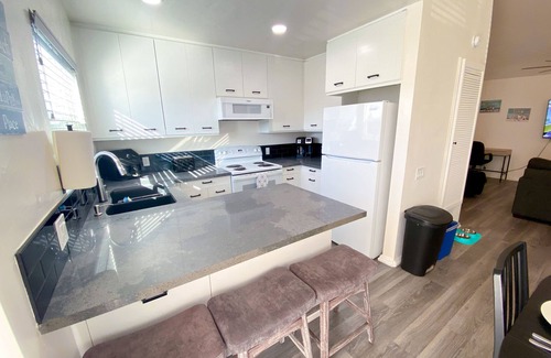Crown Point House | Bay View Condo 1/2 block to Beach Park-Spa and Private Patio-Dog Friendly