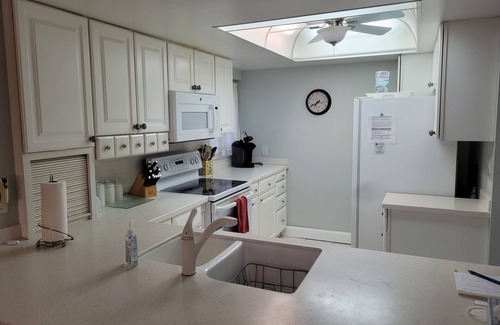 Bonita Springs Condo | Bayfront on Bonita Beach- modern, beach access, pool, community docks !