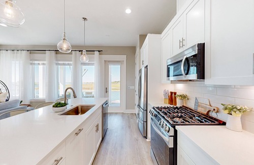 Rockport Villa | Bayfront resort villa with water view, pool, fishing pier, grills, & boardwalk