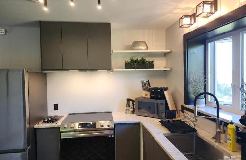 Manitoulin District Apartment | BAYSIDE RESORT, 2 O'CLOCK SUITES