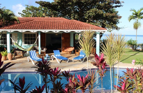 Runaway Bay Villa | Baywatch - seaside villa, modern, spectacular location & garden, pool, cook