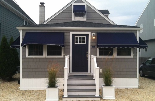 Normandy Beach House | Beach Block in Normandy Beach! Steps from beach and only local market!