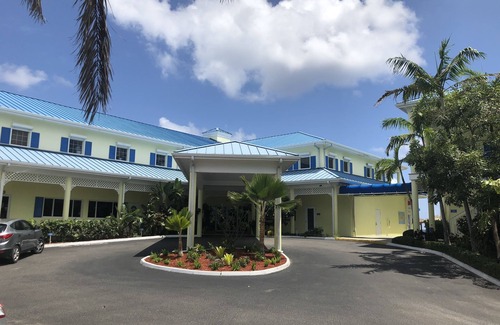 Colliers Bay Condo | Beach Front 2 bdrm/2 bath Villa CastAway Cove Resort 1st Floor