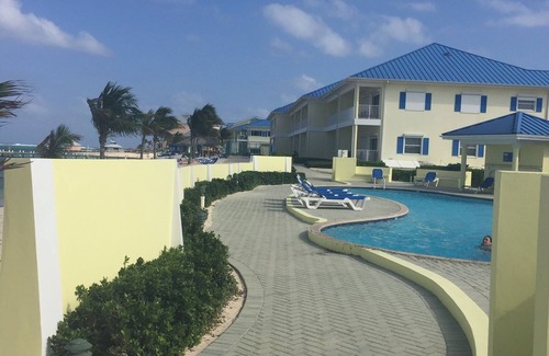 Colliers Bay Condo | Beach Front 2 bdrm/2 bath Villa CastAway Cove Resort 1st Floor