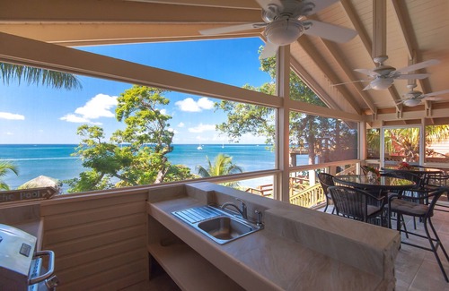 Orchid Beach Village House | BEACH front between W Bay & W End - POOL & DOCK - screen porch - Sunsets galore