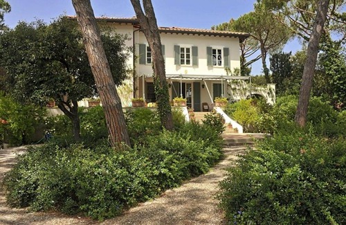 Marina di Bibbona Villa | Beach Front Bibbona, an elegant 600 sqm villa with swimming pool surrounded by a beautiful garde.