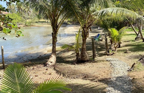 Palenque Villa | BEACH FRONT HOUSE SURROUNDeD BY 2 PRIVATE BEACHES