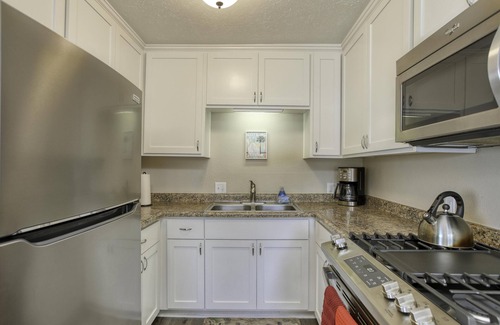 Downtown Condo | Beach just ten steps away.