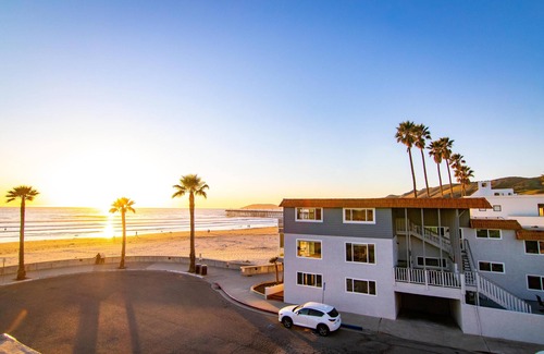 Downtown Condo | Beach just ten steps away.
