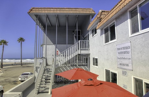 Downtown Condo | Beach just ten steps away.