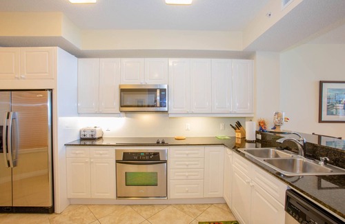 Navarre Beach Condo | BEACH SETUP Mar. thru Oct. June and July, Sat to Sat only. Sleeps 6 in beds.