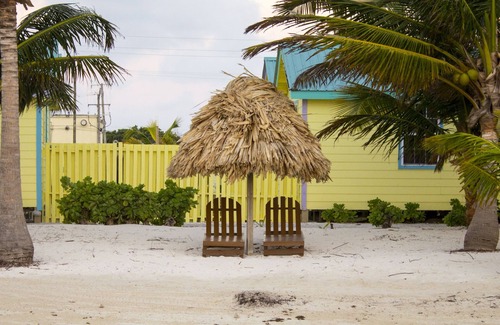 San Pedro Cottage | Beach side cottage on Private beach with freshwater pool, "coconut"- RCB