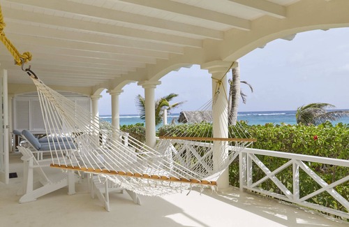 Silver Sands Apartment | Beachfront 2 bedrooms Apt. No. 3 right one the white sand beach of Silver Sands