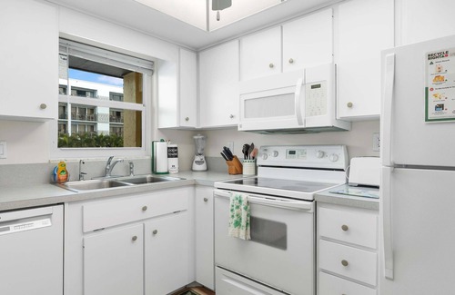 Avon By The Sea Condo | Beachfront 2BR Condo with Pool BBQ & Steps To Beach!