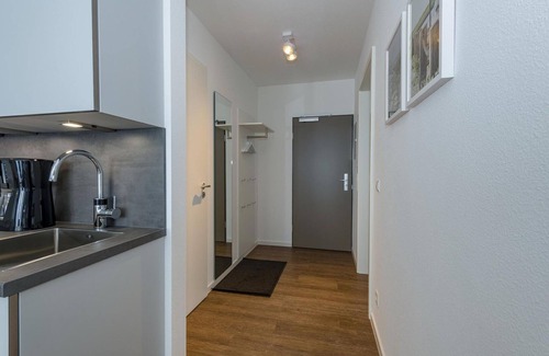 Bensersiel Apartment | Beachfront apartment with large balcony, parking, use of swimming pool & sauna -
