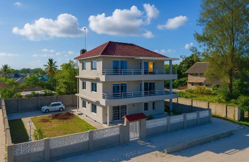 Uroa Apartment | Beachfront Bliss 2BR Suites with AC, Free WiFi Uroa Zanzibar