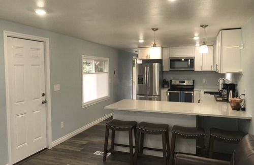 North Douglas House | Beachfront community with city and mountain view.