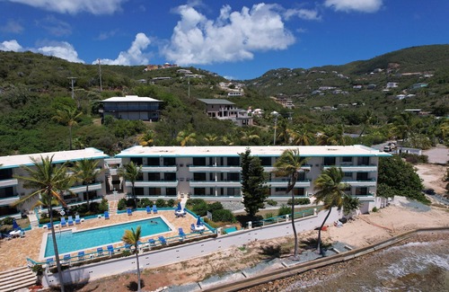 Bolongo Bay Apartment | Beachfront Condominium + bar/restaurant on-site: LeBlu