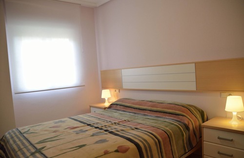 El Moncayo Apartment | Beachfront apartment with swimming pool, parking