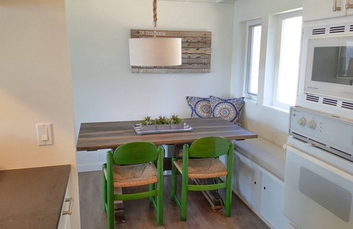Happy Camp Hideaway Cottage | Beachfront home with private yard and Unbeatable Bay and Ocean views!